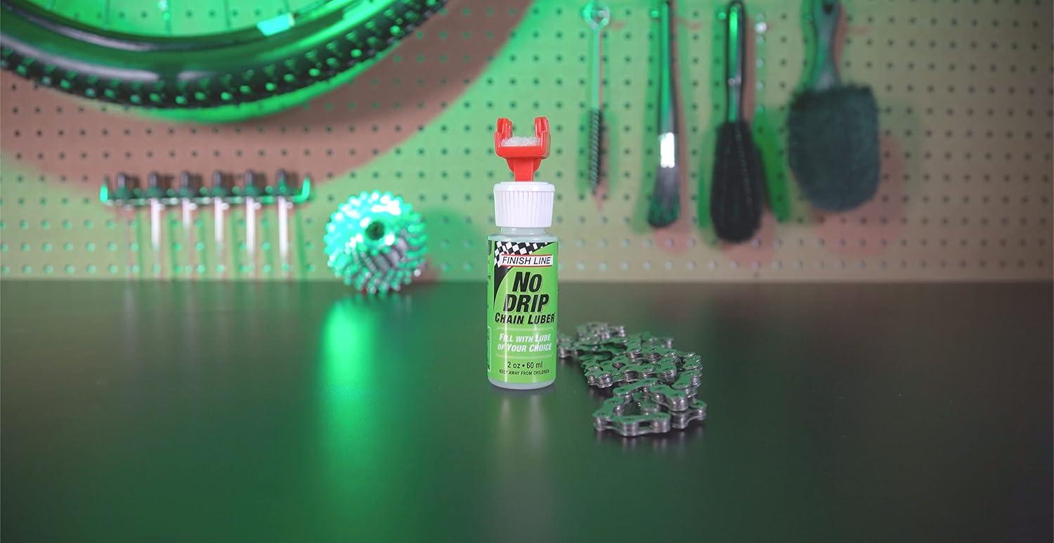 image:imageFinish Line No Drip Chain Luber Kit 4 oz Dry Lube with 2 oz Applicator Includes Extra Pads amp Travel Cap No Mess Precise Application